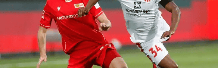 德甲对决：柏林联合残阵死守主场，多特蒙德客场冲冠破局